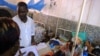 FILE - In Garoua, Cameroon, one of the two nurses at the regional hospital explains the incidence of malnutrition (D. Ntaryike/VOA).