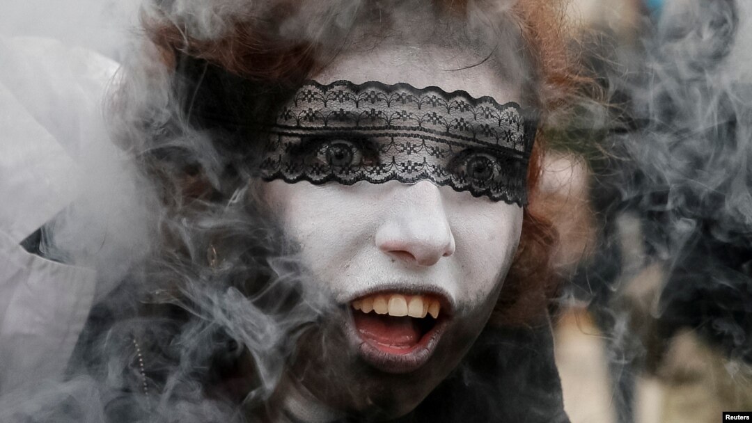 FILE - A participant takes part in a "Zombie Walk" parade in Kyiv, Ukraine, Oct. 28, 2017. 