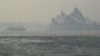 Australians Flee as Soaring Temperature, Winds Threaten to Fan Fires