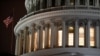 FILE - The U.S. Capitol Building as seen ahead of a vote on the coronavirus relief bill on Capitol Hill in Washington, March 25, 2020.