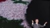 Syria's President Bashar al-Assad speaks at the Opera House in Damascus January 6, 2013, in this handout photograph released by Syria's national news agency SANA.