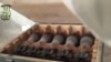 In this screen grab from a video posted to You Tube by Syrian activists, rebels who claim to have captured a government arm depot show crates rockets and other arms. 