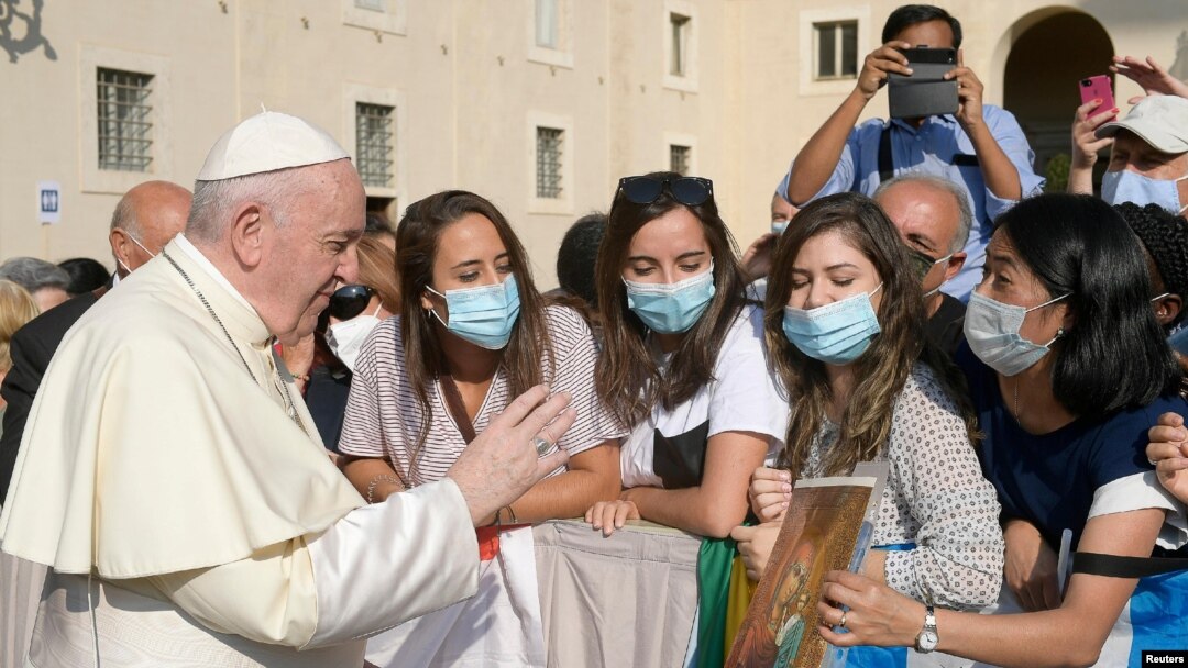 Pope Francis greets faithful as he attends the weekly general audience at the Vatican, Sept. 16, 2020. 