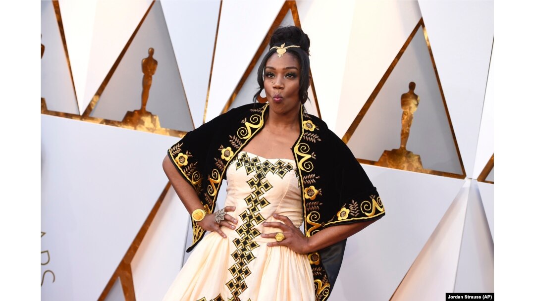 FILE - Tiffany Haddish arrives at the Oscars at the Dolby Theatre in Los Angeles, March 4, 2018.
