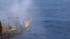 Flames are seen at a drilling platform for combustible ice after a completion of a 60-day mining trail in the Shenhu area of South China Sea, southeast of Zhuhai, Guangdong province, China, July 9, 2017
