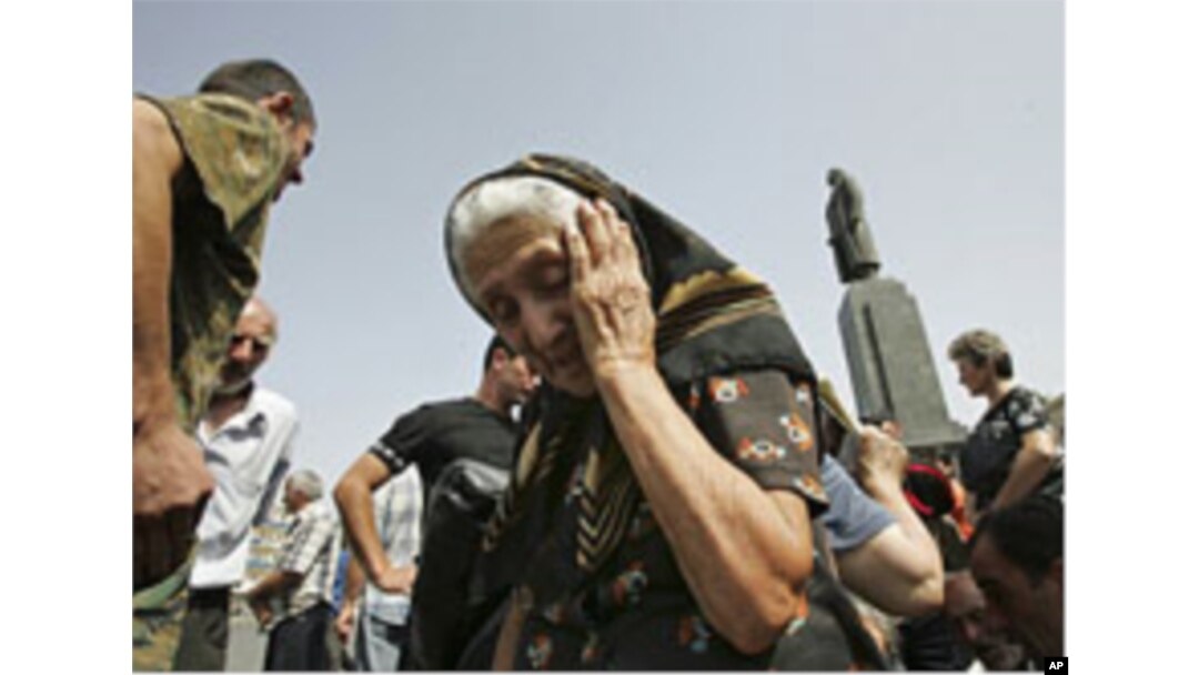 Georgian refugees from surrounding villages, are seen at the central square in the town of Gori, northwest of the capital Tbilisi, Georgia, August 26, 2008