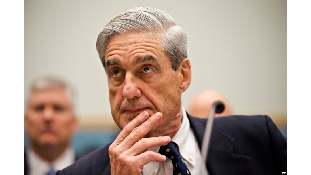 FILE - Then-FBI Director Robert Mueller testifies on Capitol Hill in Washington, June 13, 2013.