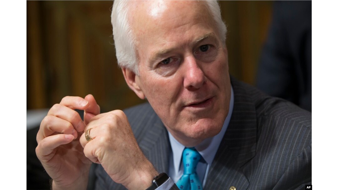 FILE - Sen. John Cornyn, R-Texas, arrives for a hearing at the Senate Judiciary Committee on Capitol Hill in Washington, March 16, 2016.