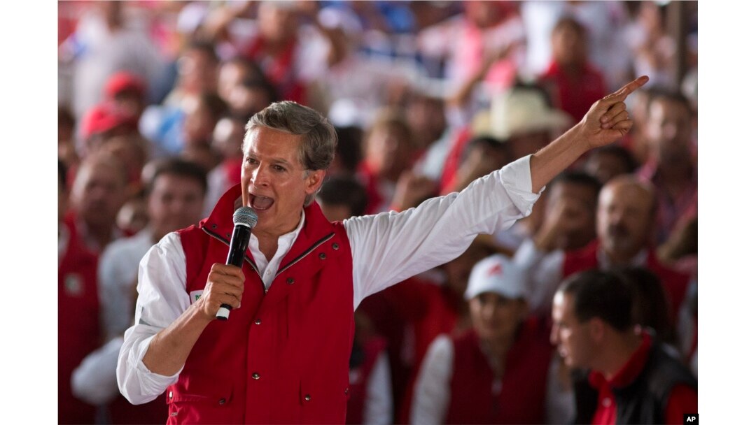 Alfredo Del Mazo, Mexico state gubernatorial candidate for the ruling Institutional Revolutionary Party, or PRI, speaks to supporters during a campaign closing rally in Ecatepec, Mexico state, May 31, 2017. With more than 11 million voters, the state of Mexico is the largest potential prize of three PRI-controlled states holding gubernatorial races.