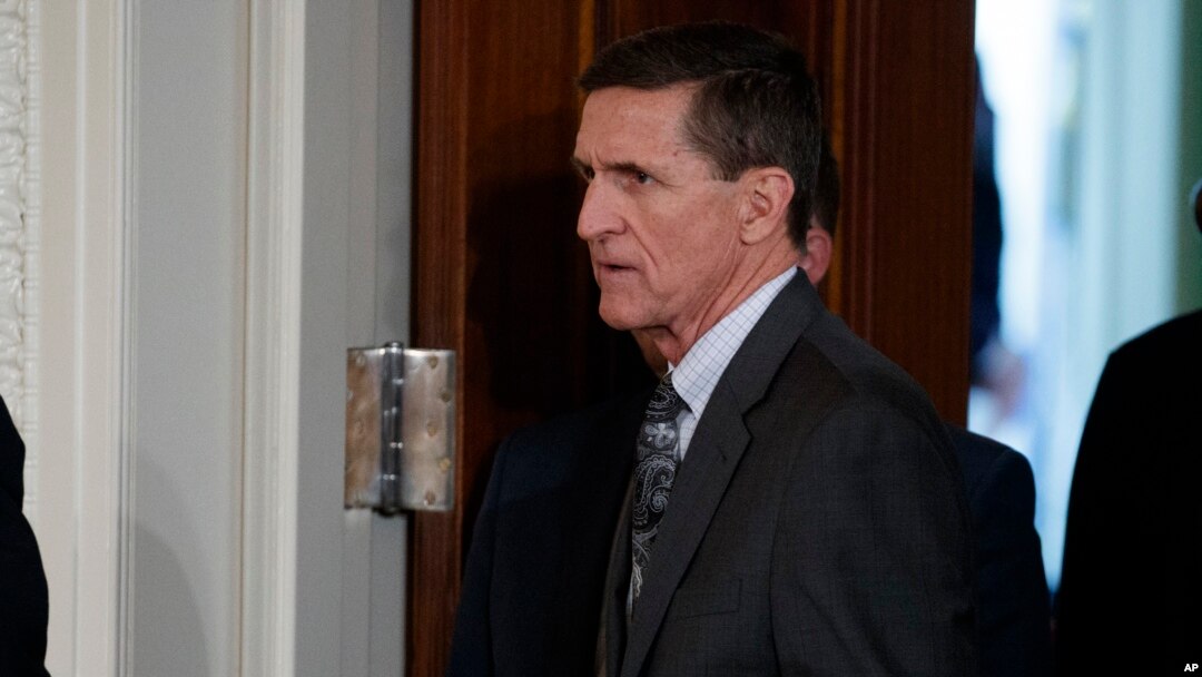 FILE - Mike Flynn arrives for a news conference in the East Room of the White House in Washington, Feb. 13, 2017. 