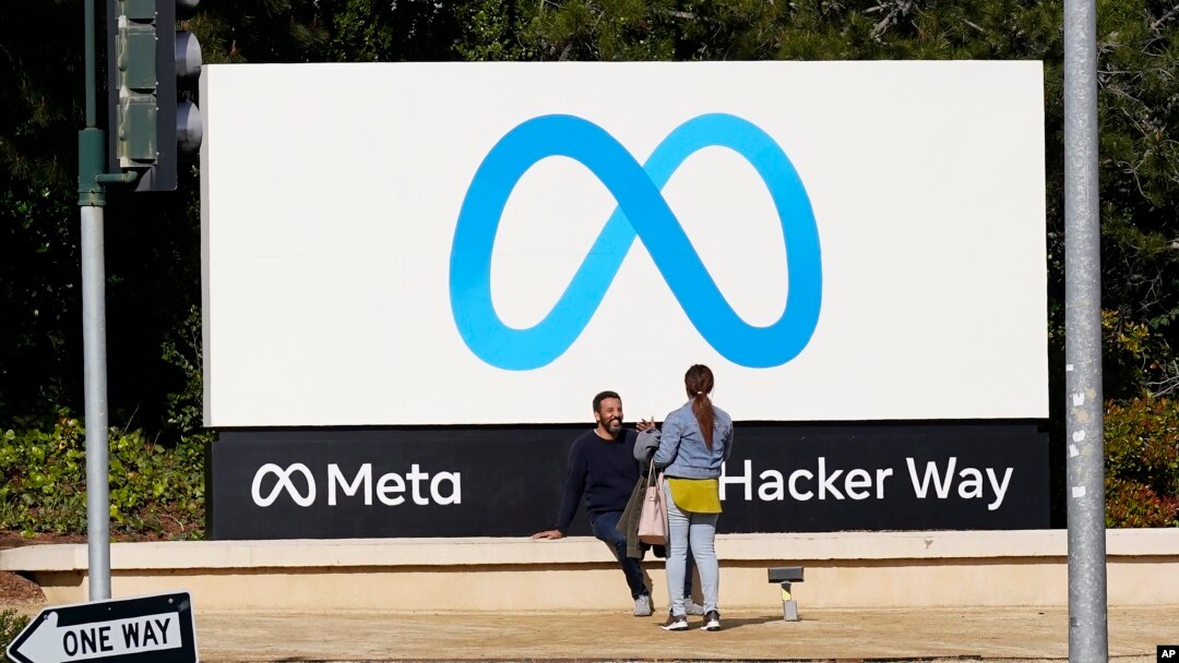 FILE - A Meta sign outside of the company's headquarters in Menlo Park, Calif. 