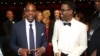Dave Chappelle (l) and Chris Rock appear backstage at the Oscars, Feb. 28, 2016, at the Dolby Theatre in Los Angeles. 