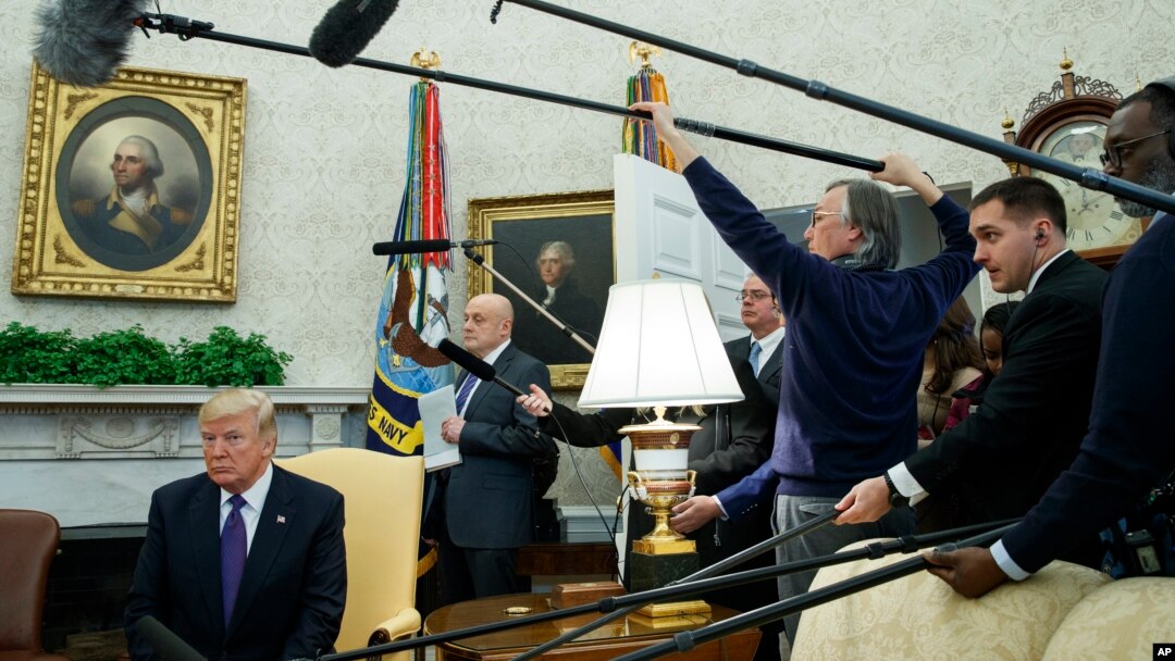 President Donald Trump listens as he meets with Kazakhstan's President Nursultan Nazarbayev in the Oval Office, Jan. 16, 2018.