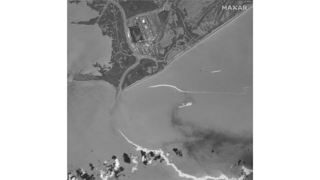 This satellite image provided by Maxar Technologies shows an overview of Port Fourchon, La., and oil slicks on Sept. 2, 2021.
