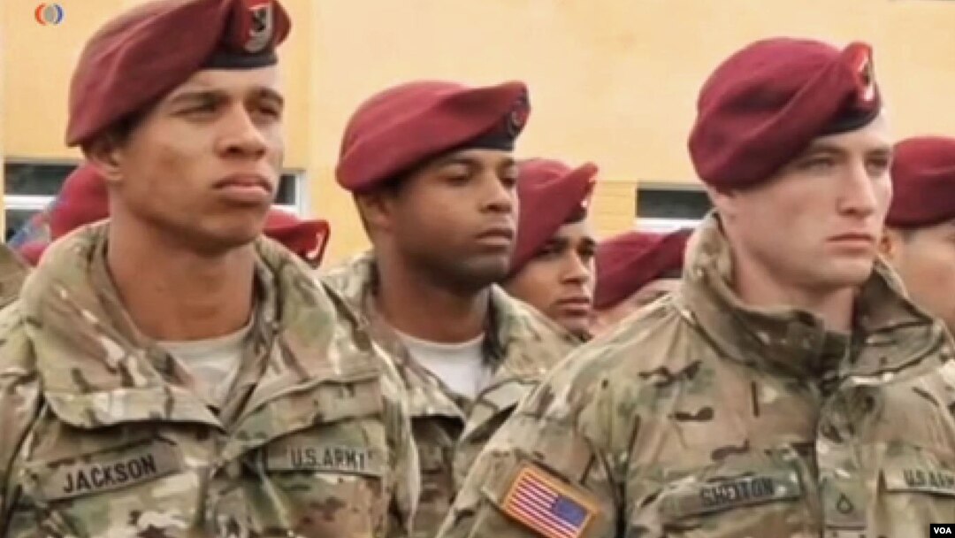 In this image taken from video, American military trainers are seen at the launch of joint U.S.-Ukrainian exercises in Yavoriv, Lviv region, western Ukraine, April 20, 2015. 