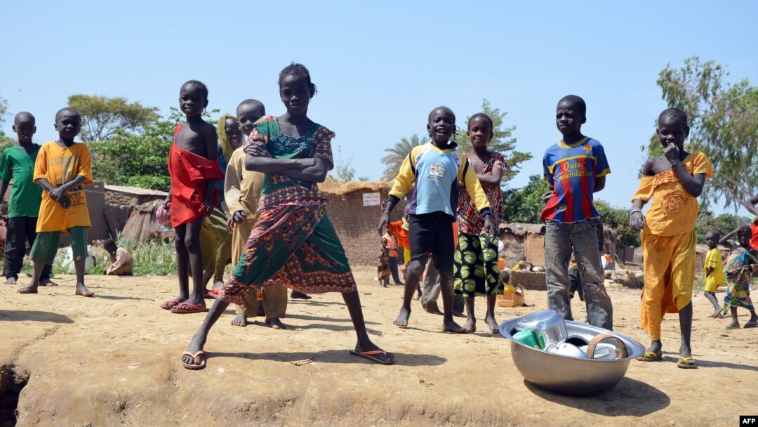 FILE - Children are seen posing in Blaram in northern Cameroon on March 1, 2013.