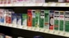 FILE - Cough syrup containing dextromethorphan is displayed at a pharmacy in Edmond, Okla.