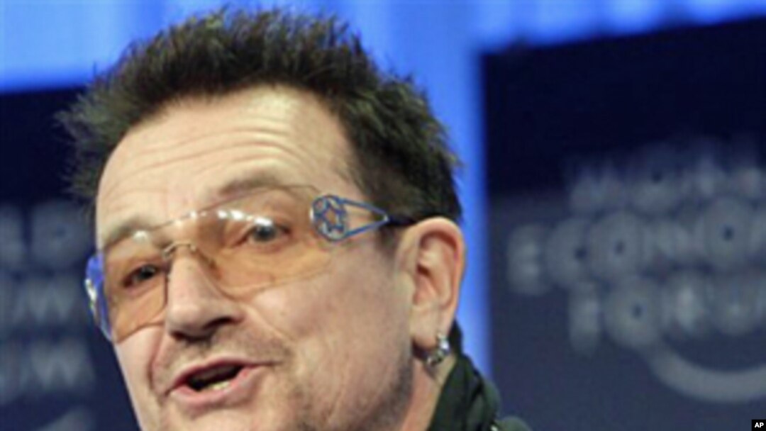 Irish musician Bono speaks during the World Economic Forum in Davos, January 28, 2011