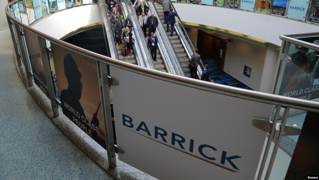 FILE - The logo of sponsor Barrick Gold Corporation is seen as visitors arrive at the Prospectors and Developers Association of Canada (PDAC) annual convention in Toronto, Canada March 4, 2019. 