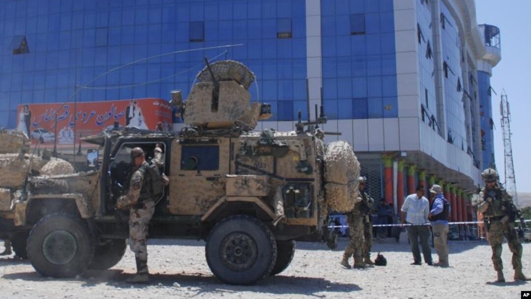 U. S. soldiers inspect the site of a suicide bombing in Samangan province north of Kabul, Afghanistan, Saturday, July, 14, 2012. 
