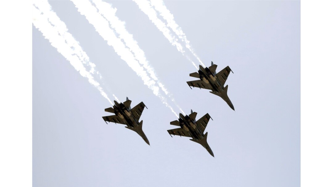 Indian Air Force (IAF) Sukhoi Su-30MKI fighter jets perform to show gratitude towards the frontline healthworkers fighting the coronavirus disease (COVID-19) outbreak, in Gandhinagar, May 3, 2020.