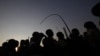 Miners gather for a report back on negotiations at South Africa's Lonmin's Marikana mine August 29, 2012.