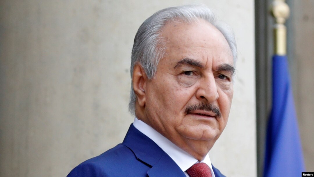FILE - Khalifa Haftar, the military commander who dominates eastern Libya, arrives at an international conference on Libya at the Elysee Palace in Paris, May 29, 2018. 