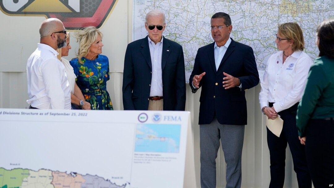 President Joe Biden and first lady Jill Biden receive a briefing on Hurricane Fiona damage from Puerto Rico Gov. Pedro Pierluisi, Oct. 3, 2022, in Ponce, Puerto Rico.