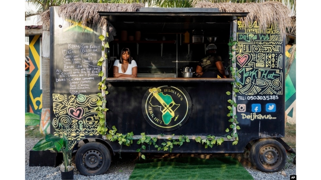 FILE - Deijha Gordon, 33, poses for a photograph in her food truck in Accra, Ghana, Dec. 11, 2024. Deijha, who relocated from New York, has obtained Ghanaian citizenship.