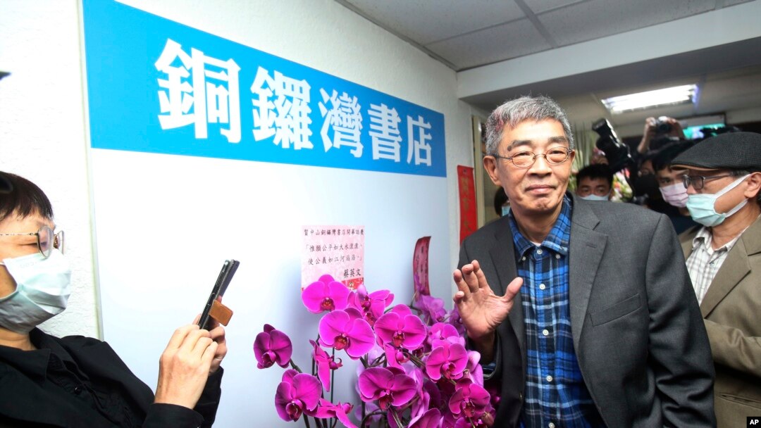 Lam Wing-kee, one of five shareholders and staff at the Causeway Bay Book shop in Hong Kong, waves to the press at his new book shop on the opening day in Taipei, Taiwan, April 25, 2020.