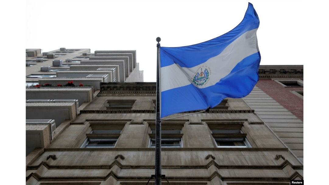 FILE - The El Salvador national flag hangs outside the Consulate General of El Salvador in Manhattan, New York, Jan. 8, 2018.