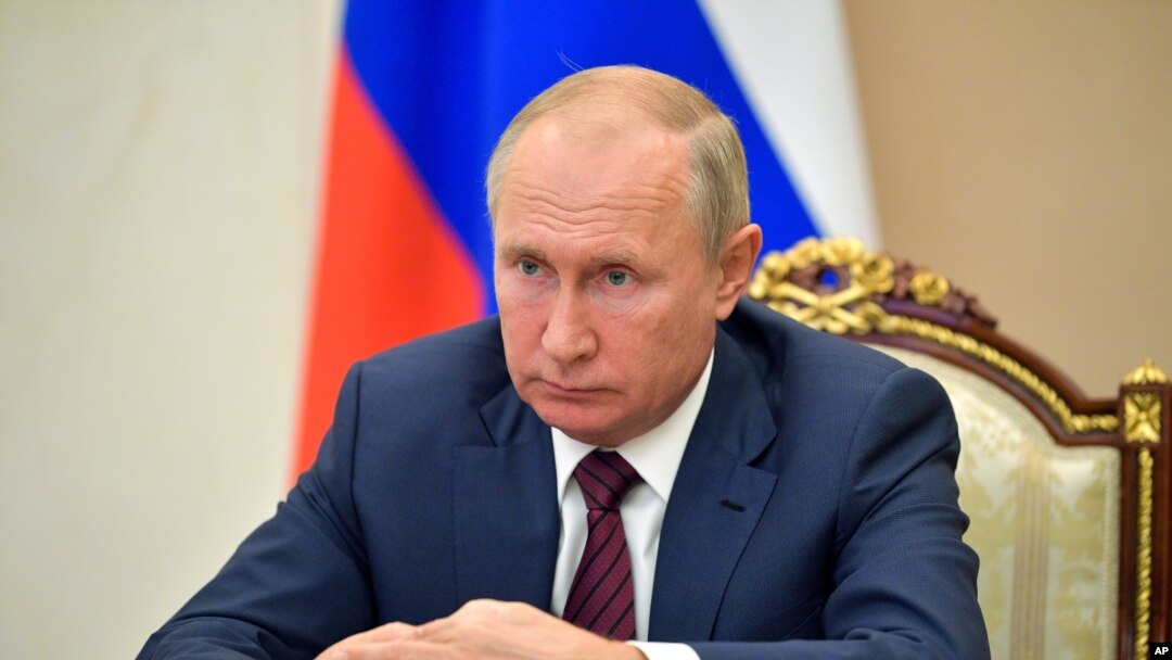 Russian President Vladimir Putin attends a meeting via video conference in Moscow, Nov. 5, 2020. 