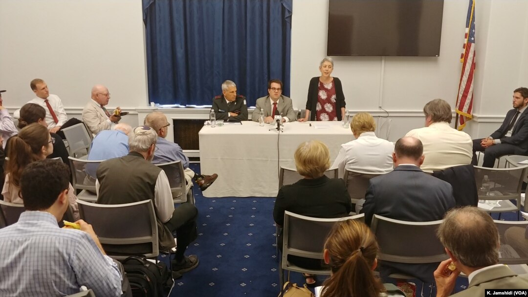 Jewish Policy Center senior director Shoshana Bryen, right, speaks at the start of a panel discussion at the Cannon House Office Building in Washington, July 11, 2018.