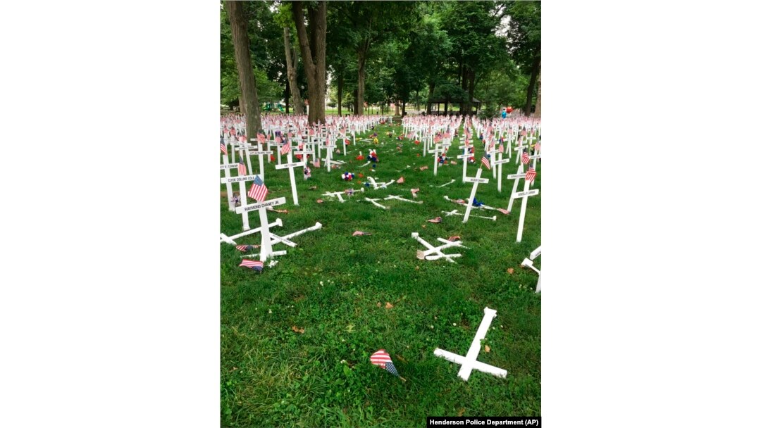 A Memorial Day display of crosses is destroyed after a vehicle drove through them in Henderson, Kentucky's Central Park, May 28, 2016. The display honors the names of more than 5,000 from the city and county of Henderson who served in conflicts dating back to the Revolution.
