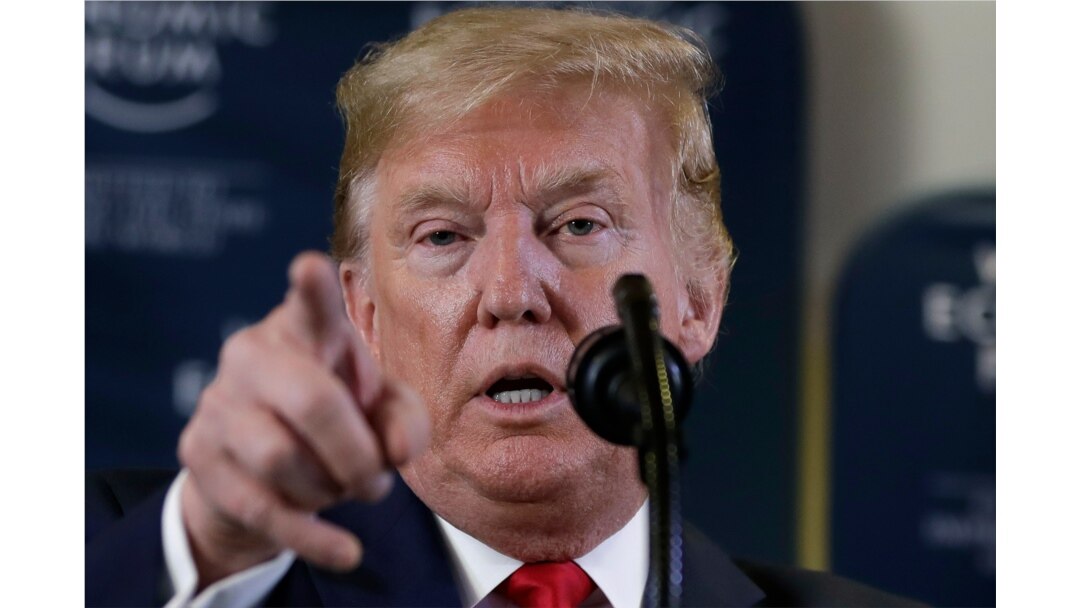 In this Jan. 22, 2020 photo, President Donald Trump speaks during a news conference at the World Economic Forum in Davos, Switzerland. T