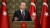 Tayyip Erdogan addresses a gathering of local leaders in Ankara, Turkey, Dec. 1, 2016.
