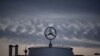 FILE - The Mercedes star is pictured at the Mercedes Benz headquarters in Stuttgart, Germany, July 8, 2020.