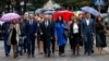 FILE - Supporters of Belgrade-backed Srpska Lista arrive at a polling station in the ethnically divided town of Mitrovica, Kosovo, Oct. 6, 2019. Kosovo's election appeals authority on Dec. 25, 2024, allowed Serb List to field candidates in the upcoming parliamentary election.