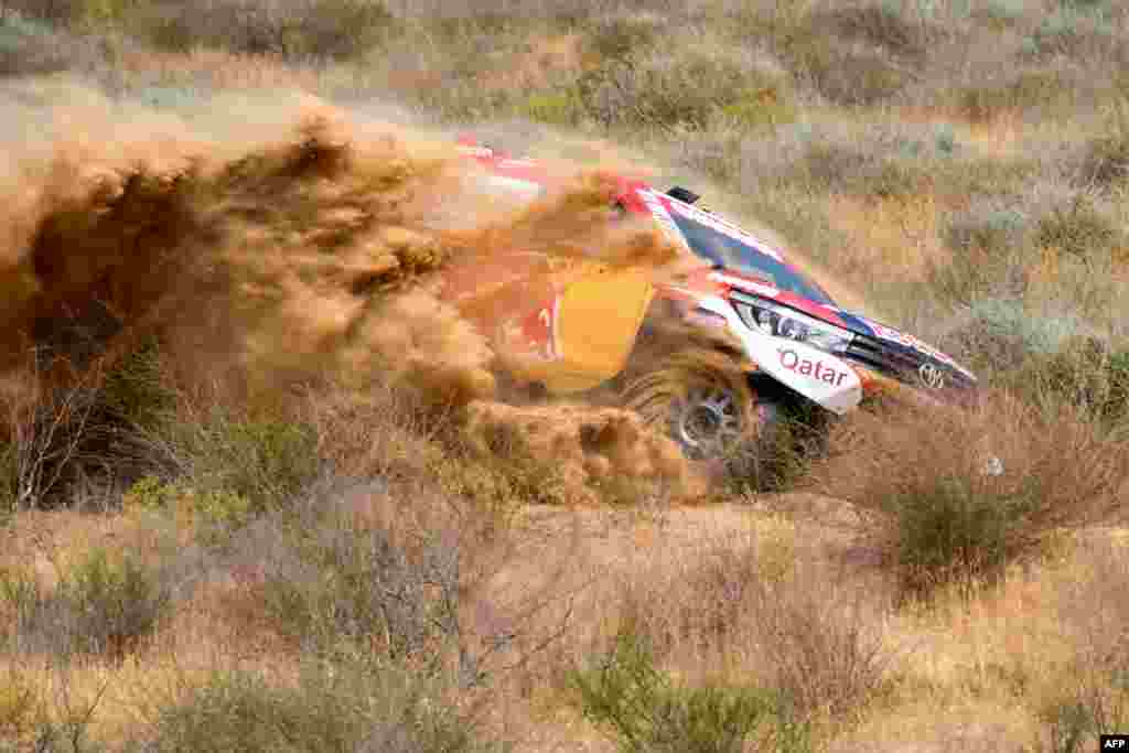 Toyota Hilux Quatar's driver Nasser Al Attiya steers his car with French co-driver Mathieu Baumel in southern Russia, on the eve of the start of Silk Way Rally 2018, between Astrakhan and Moscow.