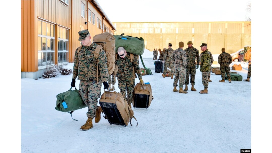 FILE - U.S. Marines, scheduled for six months of training to learn about winter warfare, arrive in Stjordal, Norway, Jan. 16, 2017.