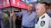 Australia's Prime Minister Scott Morrison is briefed by NSW RFS Commissioner Shane Fitzsimmons in the NSW Rural Fire Service control room in Sydney, Dec. 22, 2019.