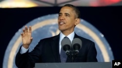 President Barack Obama speaks at US Naval Academy in Annapolis, Md., May 24, 2013