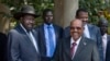 South Sudan's President Salva Kiir, left, meets with Sudan's President Omar al-Bashir, right, in the capital Juba, South Sudan, Jan. 6, 2014.
