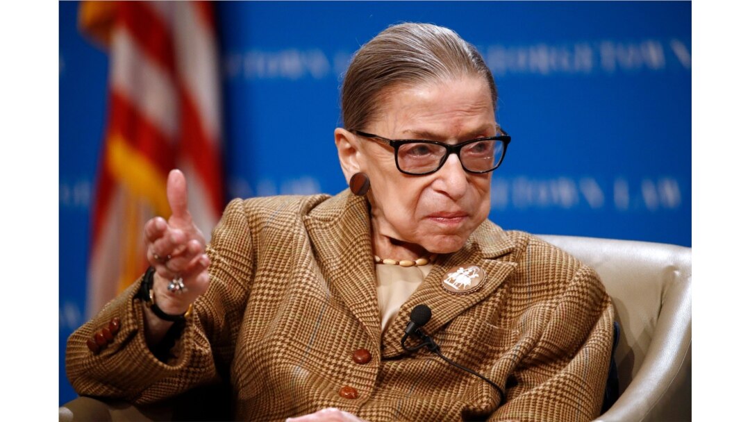 FILE - U.S. Supreme Court Associate Justice Ruth Bader Ginsburg speaks during a discussion on the 100th anniversary of the ratification of the 19th Amendment at Georgetown University Law Center in Washington, Feb. 10, 2020.