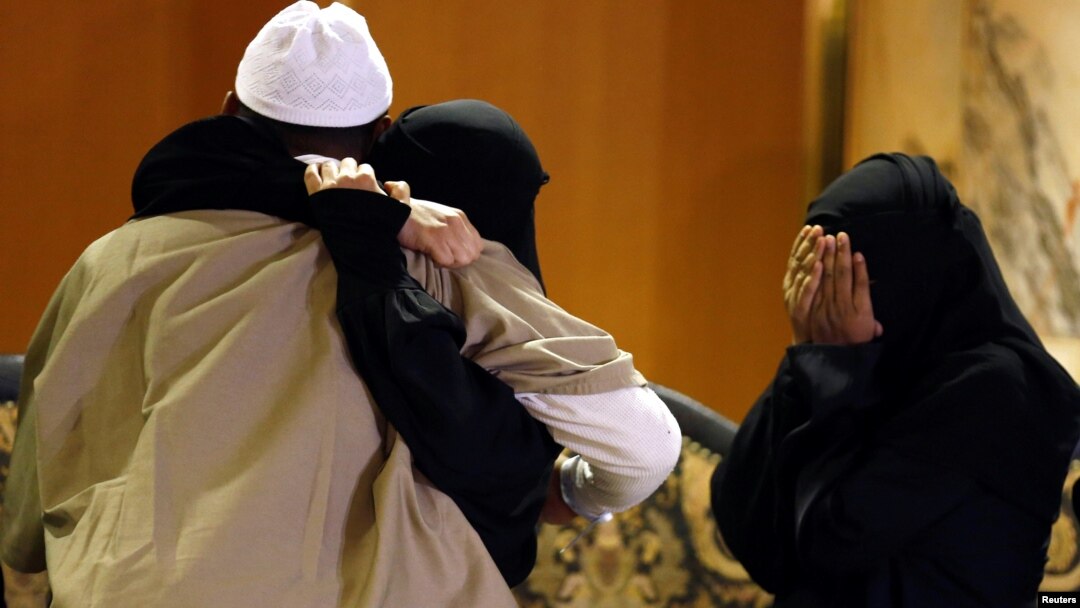 A freed Yemeni detainee is hugged by a family member after his arrival at King Khalid International Airport in Riyadh, Saudi Arabia, Jan. 5, 2017.