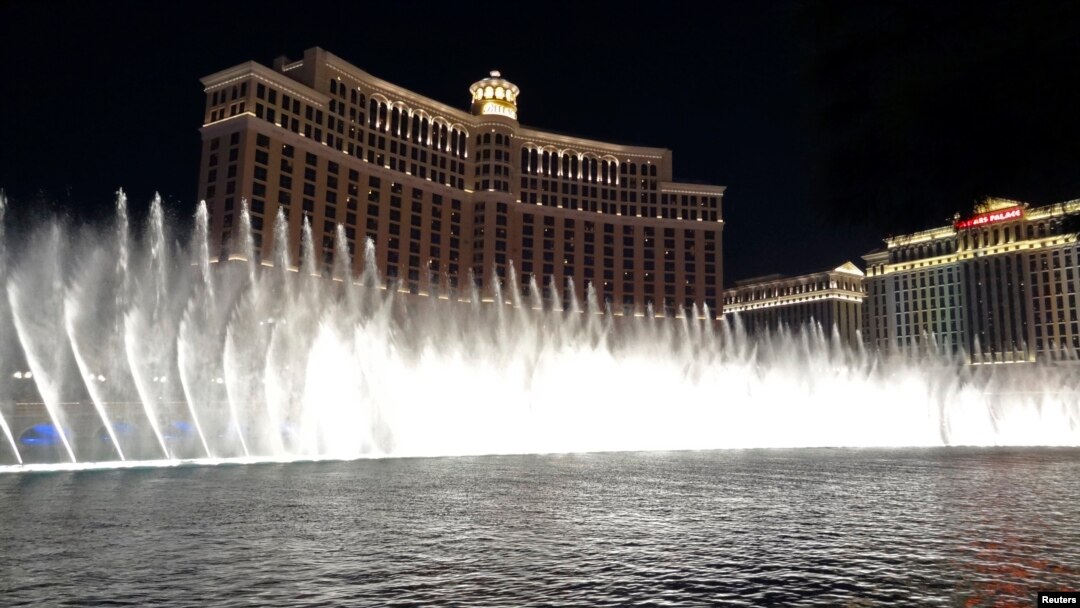 FILE -- Night view of the dancing fountains show at the Bellagio hotel in Las Vegas, Nevada.