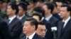中国总理李克强（右）在2014年9月20日与中国国家主席习近平在天安门广场人民烈士纪念碑前面。