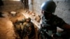 Peshmerga forces inspect a tunnel used by Islamic State militants in the town of Bashiqa, after it was recaptured from the Islamic State, east of Mosul, Iraq, Nov. 12, 2016. 