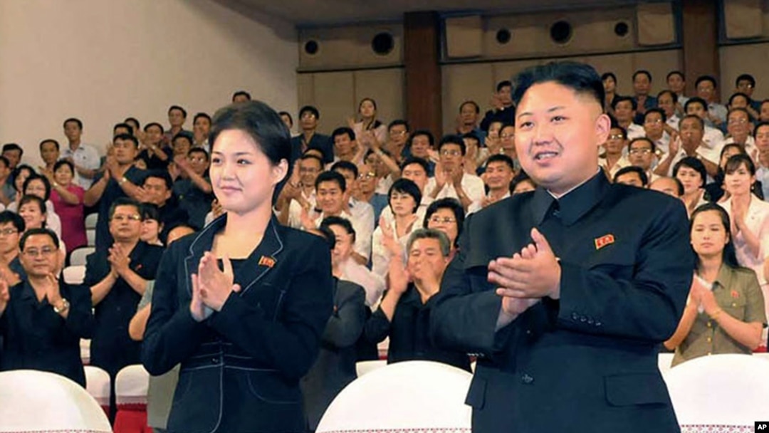 Photo released on July 9, 2012 shows North Korean leader Kim Jong Un and Ri Sol Ju during a musical performance in Pyongyang. (KCNA)
