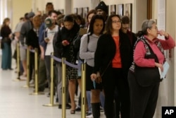 Voters line up at the Department of Elections at San Francisco's City Hall, June 7, 2016. California's changing demographics are aiding Democrats including Kamala Harris and Loretta Sanchez, competing for a U.S. Senate seat in November's election.